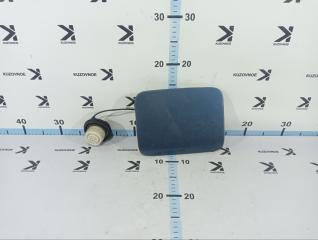 Фото запчасти лючок бензобака Subaru Outback Б/У запчасть Запчасть лючок бензобака Subaru Outback