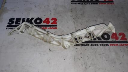 Фото запчасти крепление бампера заднее левое Mazda Axela 2005 контрактная запчасть Запчасть крепление бампера заднее левое Mazda Axela 2005