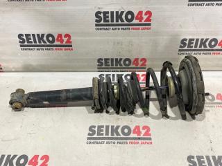 Запчасть стойка передняя левая Nissan Primera 1998