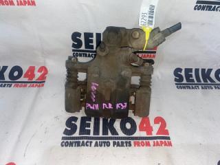 Запчасть суппорт задний правый Nissan Avenir 1999