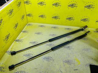 Амортизатор двери багажника Mitsubishi Lancer