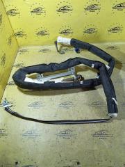 Запчасть шторка багажника левая Toyota Yaris