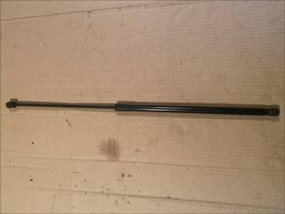 Амортизатор капота Volkswagen Passat 2006