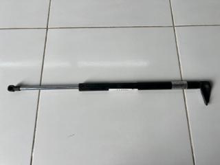 Амортизатор двери багажника левый Mazda CX-7 2010