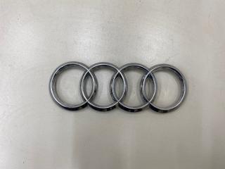 Фото запчасти эмблема на решетку радиатора Audi Q7 Б/У запчасть Запчасть эмблема на решетку радиатора Audi Q7