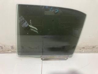 Фото запчасти стекло двери заднее левое Mazda 323 2002 Б/У запчасть Запчасть стекло двери заднее левое Mazda 323 2002