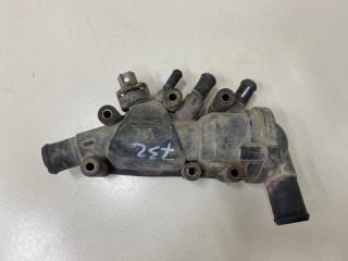 Фото запчасти корпус термостата Ford Focus 1 2004 Б/У запчасть Запчасть корпус термостата Ford Focus 1 2004