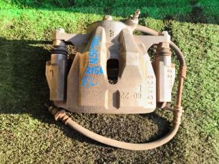 Суппорт тормозной передний левый TOYOTA SIENTA