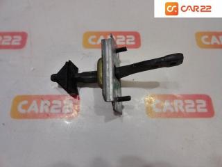 Запчасть ограничитель двери задний левый Mazda Familia