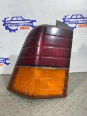 Фото запчасти фонарь задний левый Ssang Yong Musso 1995 Б/У запчасть Запчасть фонарь задний левый Ssang Yong Musso 1995