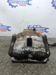 Суппорт передний левый Nissan Primera