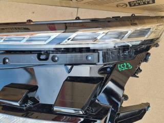 Фара левая Toyota Voxy ZWR90W