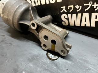 Кронштейн масляного фильтра Toyota Roomy M910A 1KR