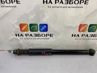 Амортизатор задний левый Nissan Almera 2014