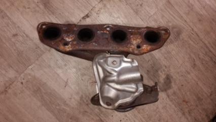 Фото запчасти коллектор выпускной Nissan Note 2012 Б/У запчасть Запчасть коллектор выпускной Nissan Note 2012