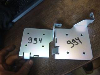 Фото запчасти крепление магнитолы Mitsubishi Pajero 2007 контрактная запчасть Запчасть крепление магнитолы Mitsubishi Pajero 2007