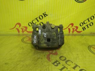 Суппорт передний правый MAZDA DEMIO