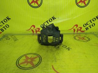 Суппорт передний левый MAZDA DEMIO