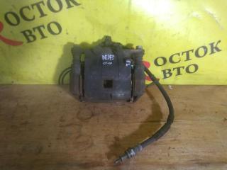 Суппорт передний левый MAZDA DEMIO