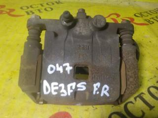 Суппорт передний правый MAZDA DEMIO