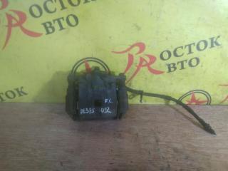 Суппорт передний левый MAZDA DEMIO