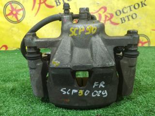 Суппорт передний правый TOYOTA VITZ