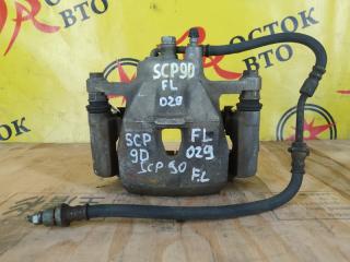 Суппорт передний левый TOYOTA VITZ