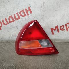 Фонарь задний наружный левый MITSUBISHI LANCER 2000