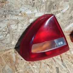 Фонарь задний наружный левый LANCER 2000 CK