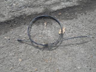 Запчасть тросик замка капота Toyota Corolla Axio ноябрь 2017