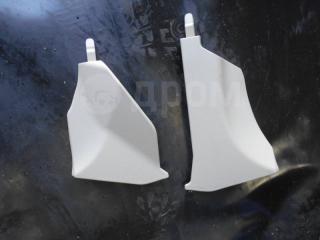 Запчасть накладка консоли между сидений концевая Toyota Corolla Axio