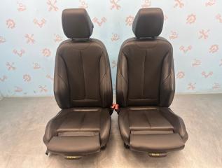 Запчасть сиденья спорт электро черная кожа передние BMW 3