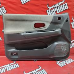 Обшивка боковой двери передняя левая Mitsubishi Montero Sport 2001