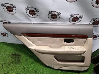 Обшивка дверей задняя левая TOYOTA PROGRES