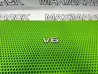 Запчасть эмблема задняя NISSAN Presage 1998