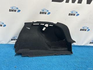 Обшивка багажного отделения правая BMW 1