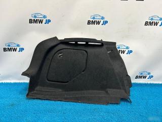 Обшивка багажного отделения левая BMW