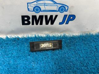 Запчасть фонарь подсветки номера задний BMW 1 2018