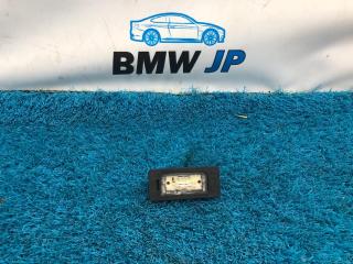 Фото запчасти фонарь подсветки номера задний BMW 3 2013 контрактная запчасть Запчасть фонарь подсветки номера задний BMW 3 2013