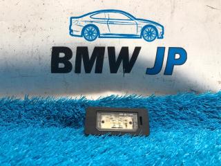 Фото запчасти фонарь подсветки номера задний BMW 3 2013 контрактная запчасть Запчасть фонарь подсветки номера задний BMW 3 2013