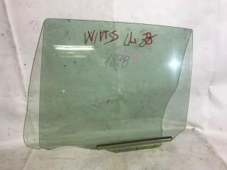 Стекло боковое заднее левое заднее левое Toyota Vitz 1999-2005