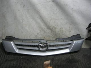 Решетка радиатора Mazda Demio 2000