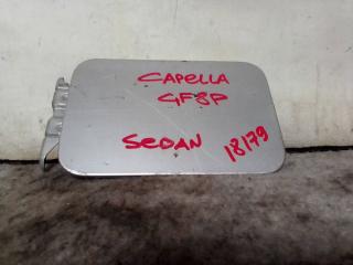 Запчасть лючок бензобака Mazda Capella 1997-2002