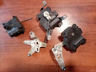 Моторчик заслонки отопителя Mitsubishi Pajero 4 Б/У Моторчик заслонки отопителя Mitsubishi Pajero 4