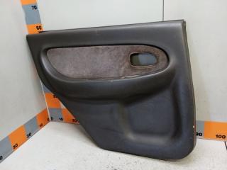 Обшивка двери задняя левая Kia Sephia 2000
