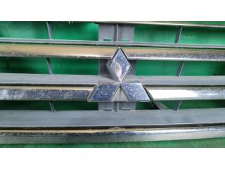 Решетка радиатора MITSUBISHI PAJERO IO H77W MR511943 4 ракурс