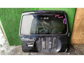 Запчасть Дверь 5-я  MITSUBISHI PAJERO MINI 2MOD Контрактный Цвет: ЧЕРНЫЙ X42   ЦАРАПИНЫ, ТЫЧКА