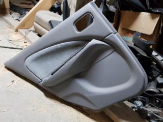 Обшивка двери задняя левая Nissan Almera 2000