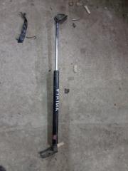 Фото запчасти амортизатор багажника Toyota Funcargo 2000 Б/У запчасть Запчасть амортизатор багажника Toyota Funcargo 2000