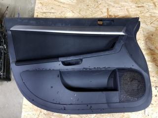 Обшивка двери передняя левая Mitsubishi Lancer 2007-2011